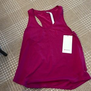 Lululemon pink tank top size 6.